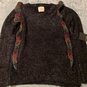 Chaser sweater with rainbow ruffle
